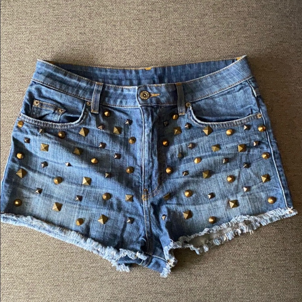 Studded Car Mar denim shorts.